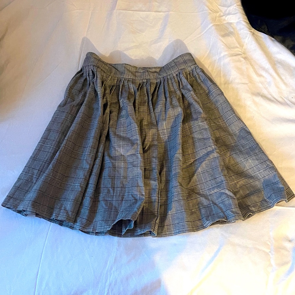 Checkered pleated skirt with pockets